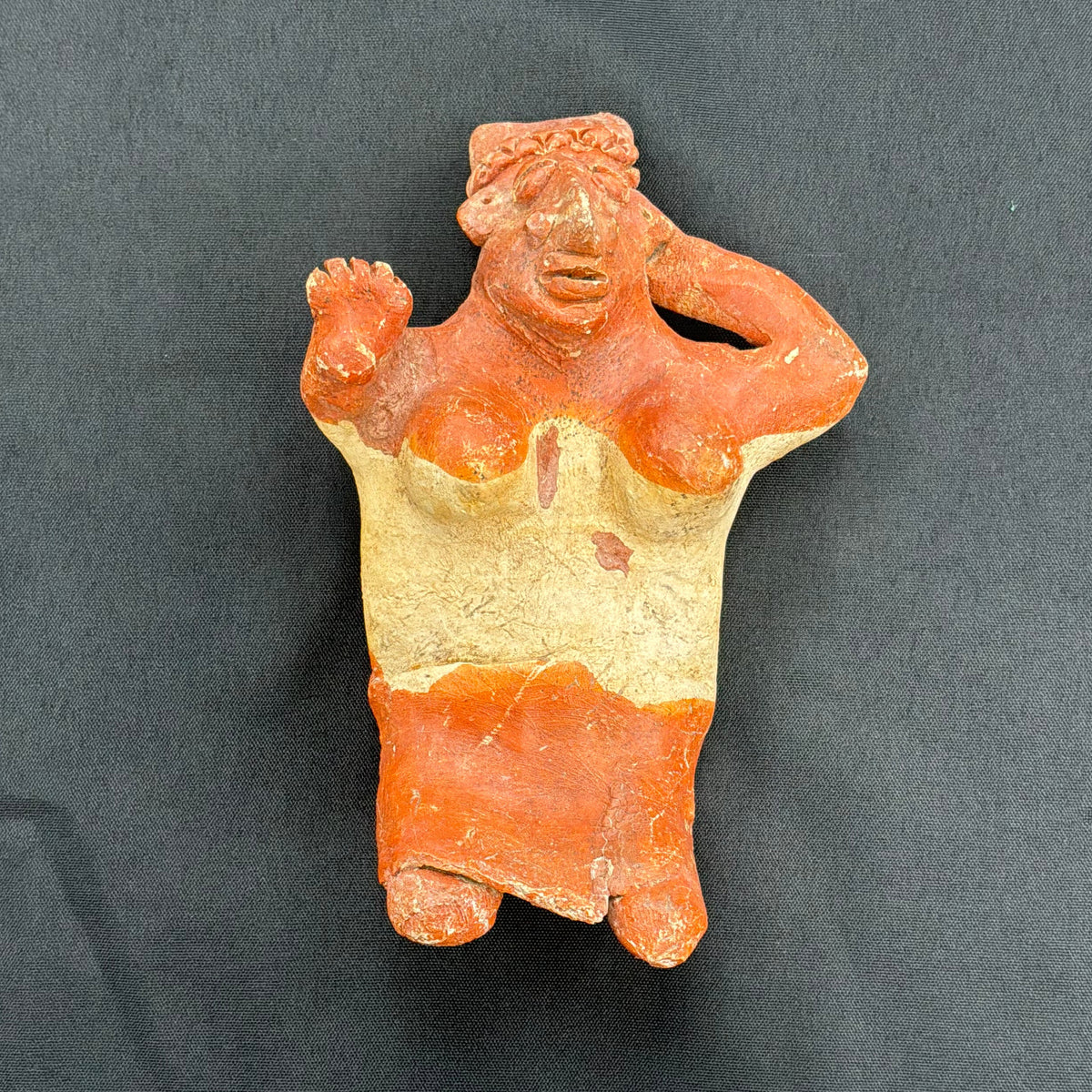 Seated Female Pottery Figure