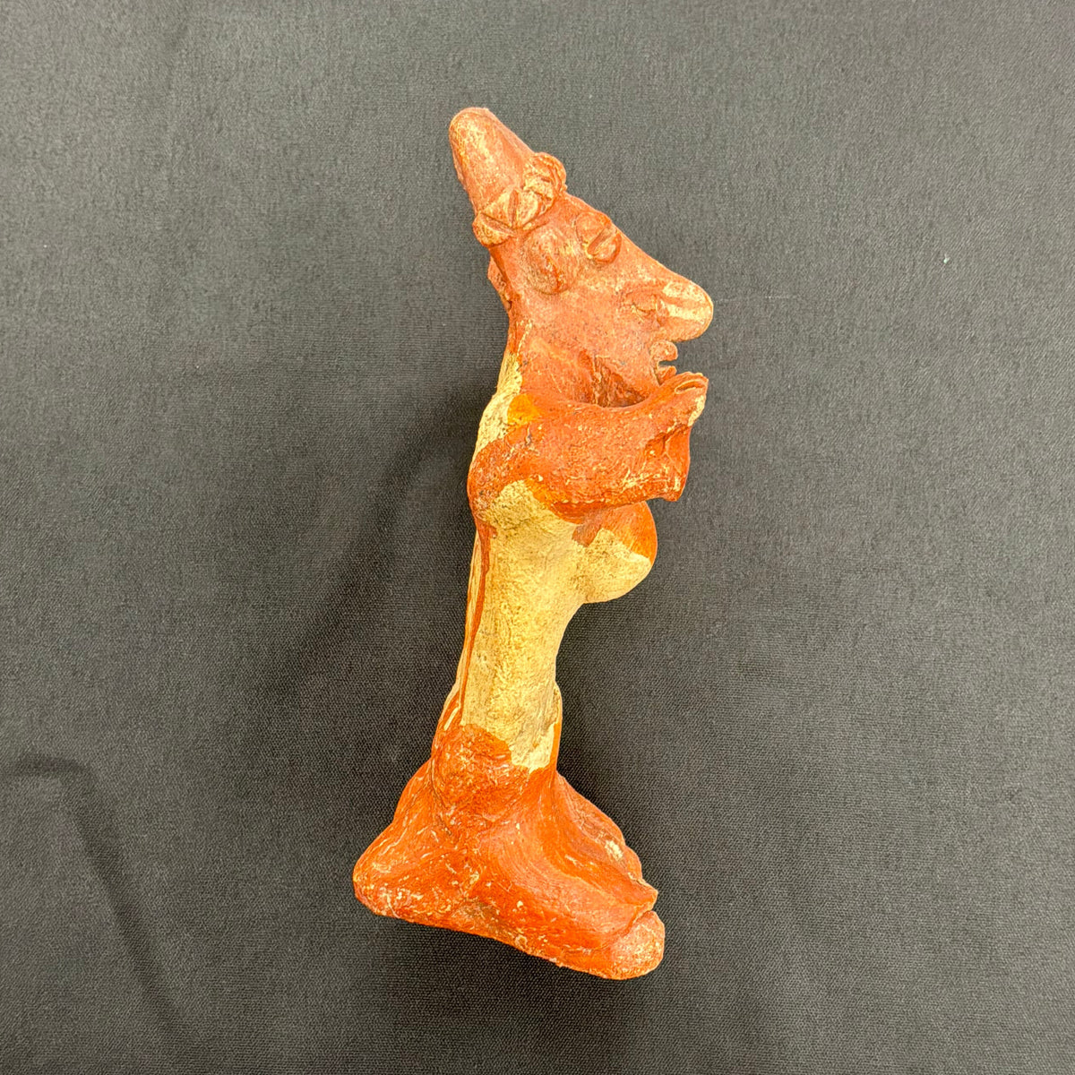 Seated Female Pottery Figure