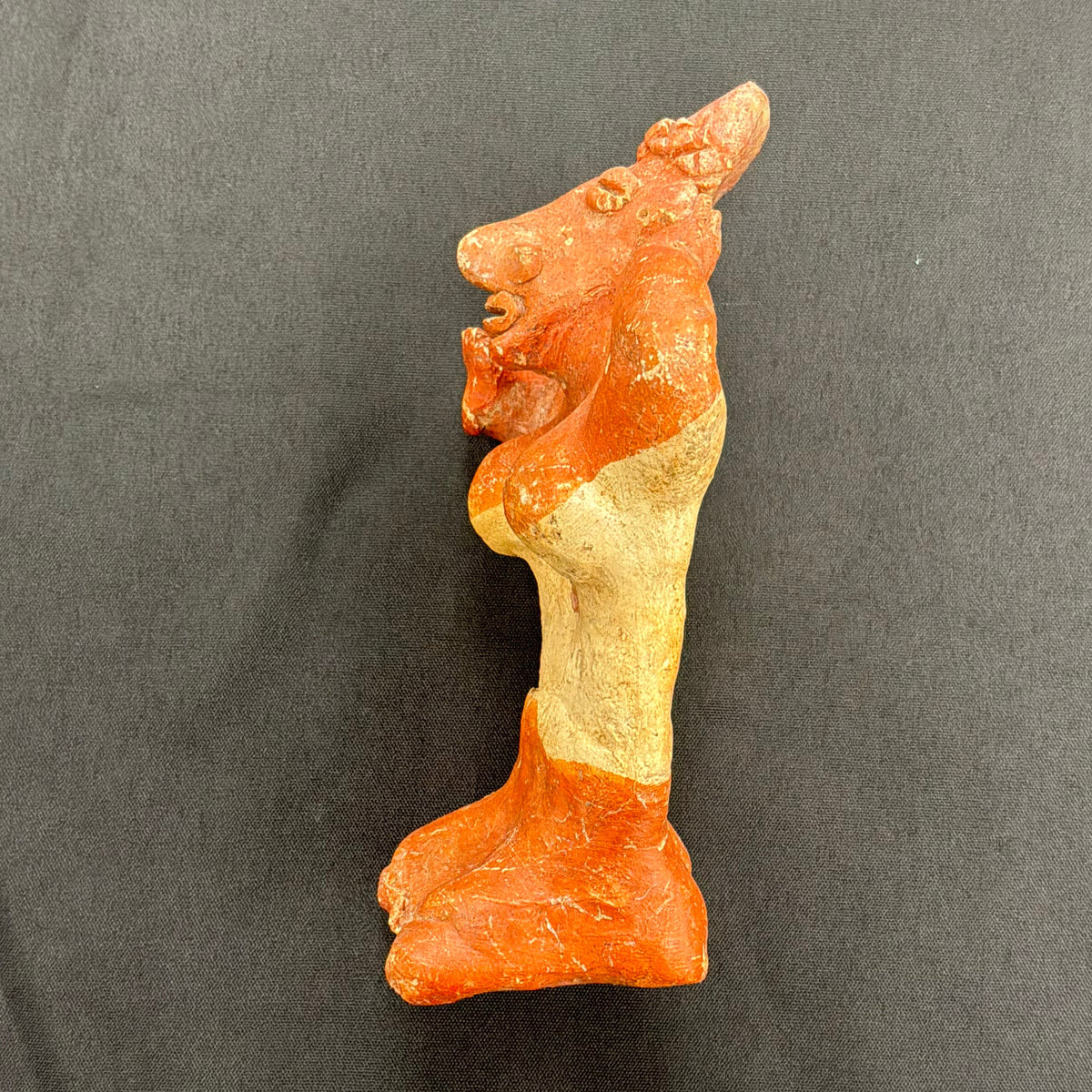 Seated Female Pottery Figure