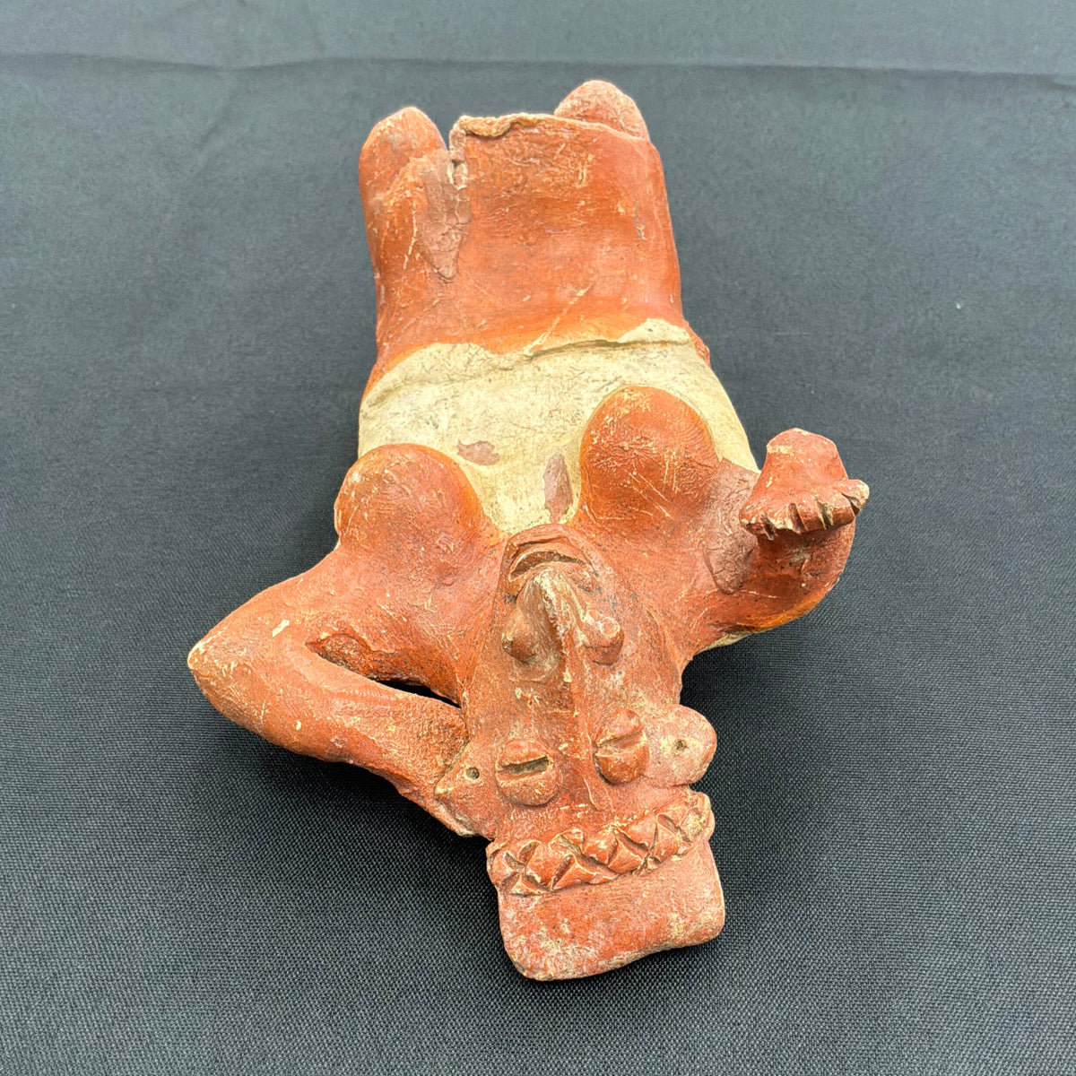 Seated Female Pottery Figure
